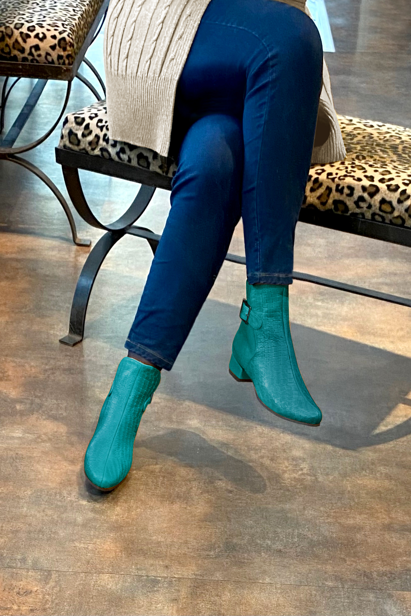 Turquoise blue women's ankle boots with buckles at the back. Round toe. Low block heels. Worn view - Florence KOOIJMAN